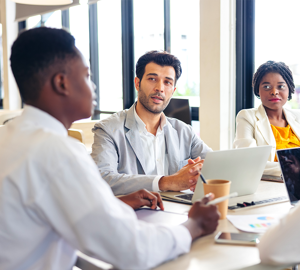 selective-focus-multi-ethnic-group-young-people-studying-together